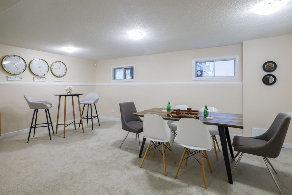 Finished basement family room with modern living and dining space