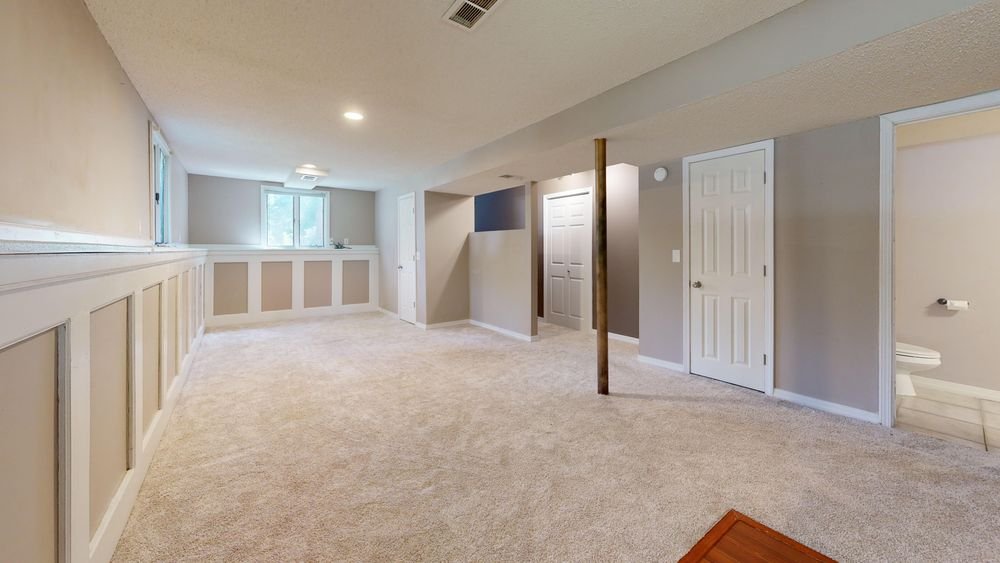 Spacious modern finished basement staged for resale appeal