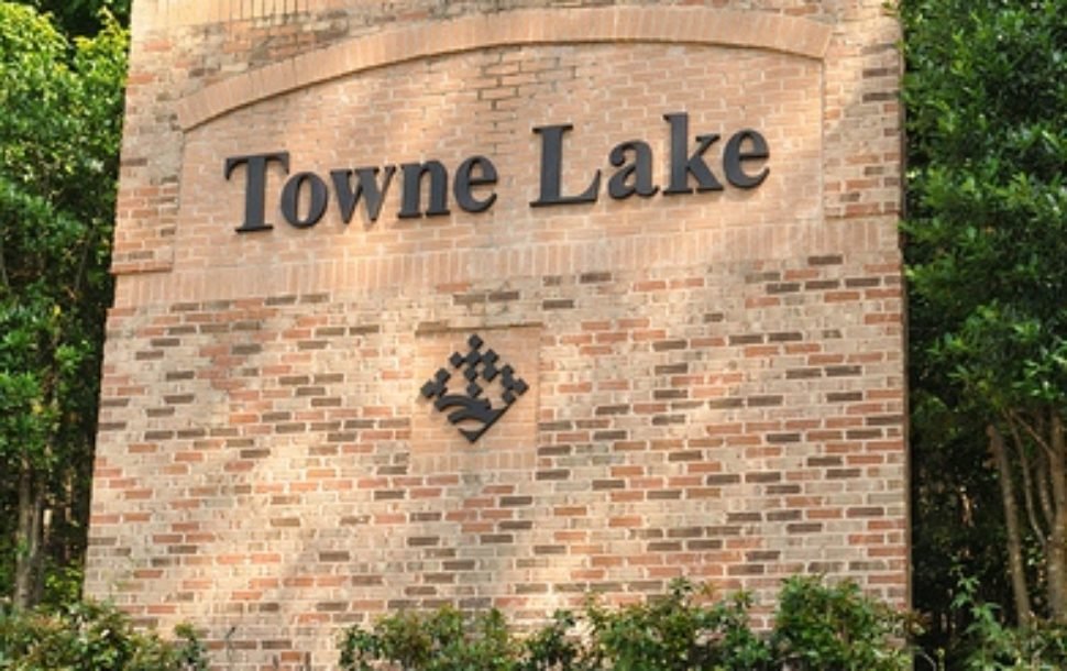 Towne Lake Woodstock GA real estate market luxury homes investment Atlanta area